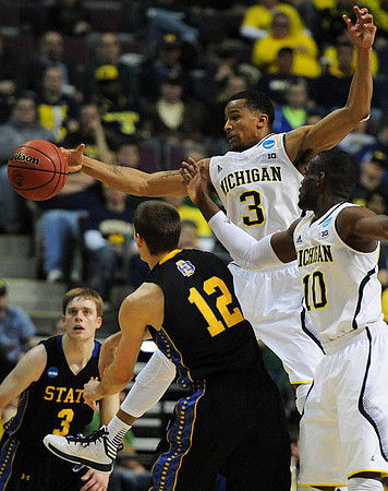 Trey Burke (3) and Tim Hardaway Jr. (10)