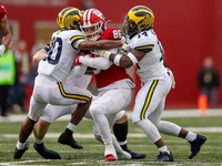Daxton Hill (30) and Josh Metellus (14)