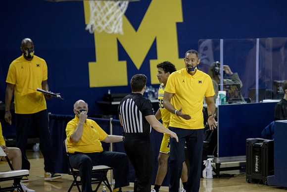 Chris Hunter, Phil Martelli, Eli Brooks (55), and Juwan Howard