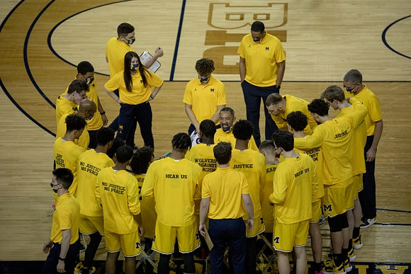 Juwan Howard and Michigan Team