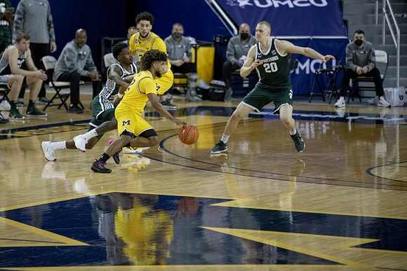 Mike Smith (12) and Brandon Johns Jr. (23)