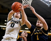 Hunter Dickinson (1) and Caleb Houstan (22)