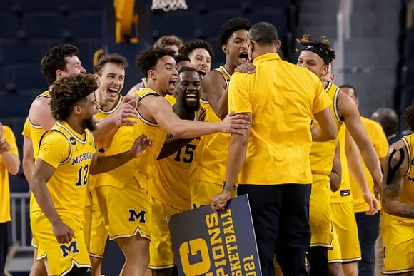 Juwan Howard and Michigan Team