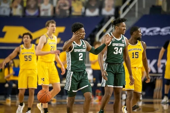 Eli Brooks (55), Franz Wagner (21), and Chaundee Brown Jr. (15)