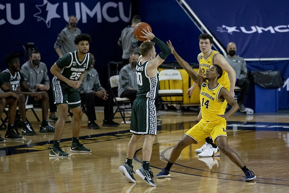 Rico Ozuna-Harrison (14) and C.J. Baird (24)
