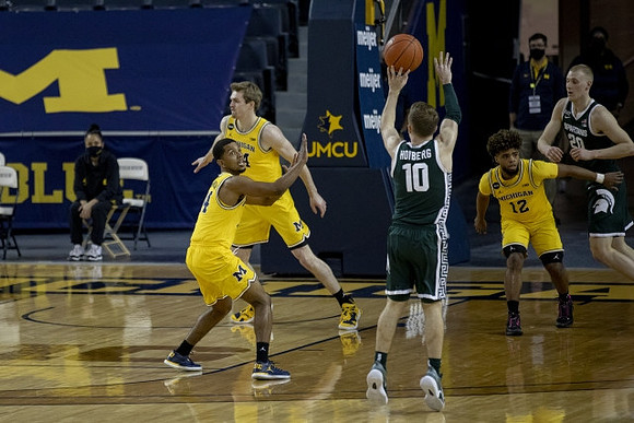 Rico Ozuna-Harrison (14), Jaron Faulds (44), and Mike Smith (12)