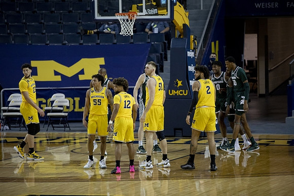 Brandon Johns Jr. (23), Eli Brooks (55), Mike Smith (12), Austin Davis (51), and Isaiah Livers (2)