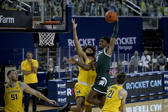 Austin Davis (51), Isaiah Livers (2), Franz Wagner (21), and Juwan Howard