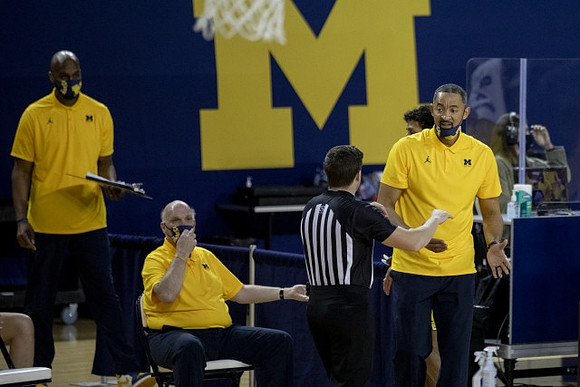 Chris Hunter, Phil Martelli, and Juwan Howard