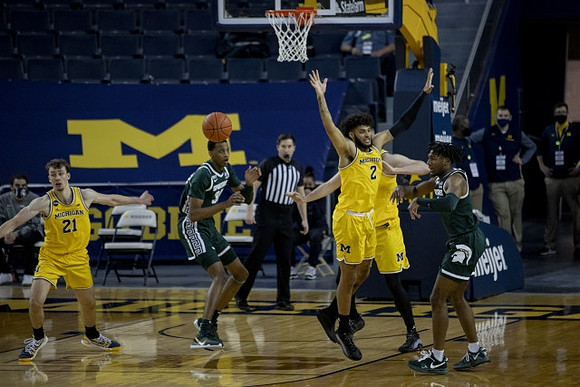 Franz Wagner (21), Isaiah Livers (2), and Hunter Dickinson (1)
