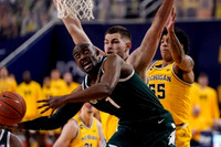 Hunter Dickinson (1), Eli Brooks (55), and Franz Wagner (21)