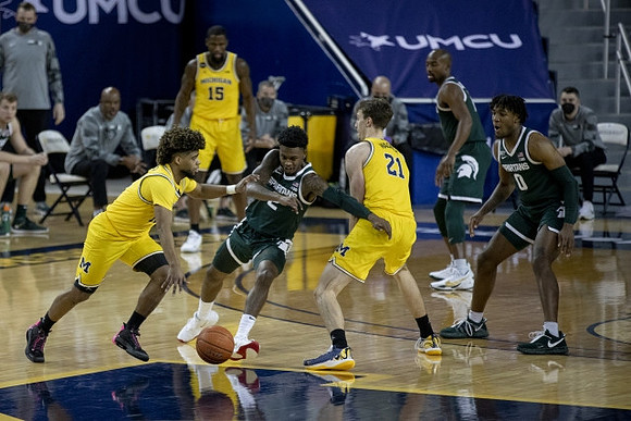 Mike Smith (12), Chaundee Brown Jr. (15), and Franz Wagner (21)