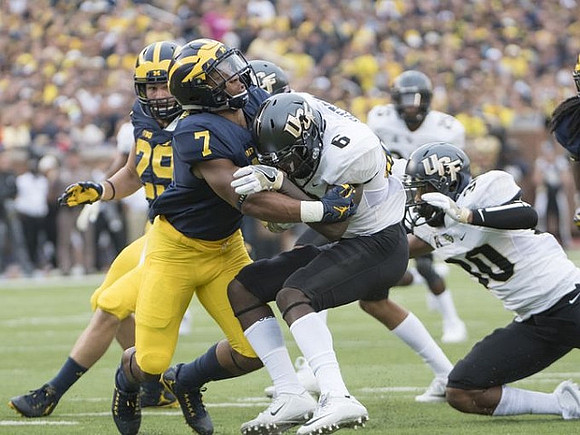 Jordan Glasgow (29) and Khaleke Hudson (7)