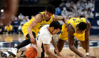 Eli Brooks (55) and Moussa Diabate (14)