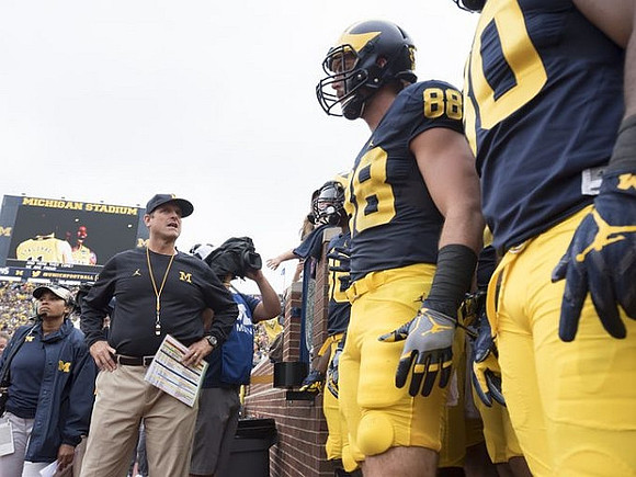 Jim Harbaugh and Jake Butt (88)