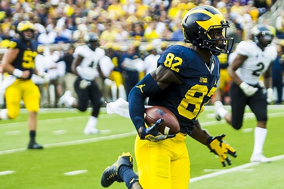 Mason Cole (52) and Amara Darboh (82)