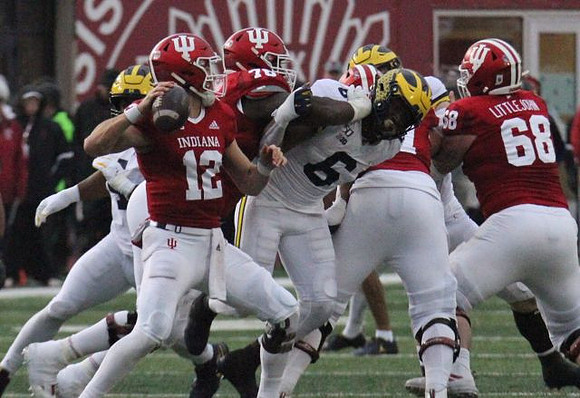 Cameron McGrone (44) and Josh Uche (6)