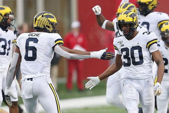 Vincent Gray (31), Josh Uche (6), and Daxton Hill (30)