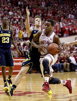 Caris LeVert (23) and Spike Albrecht (2)