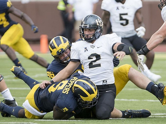 Jabrill Peppers (5) and Ryan Glasgow (96)