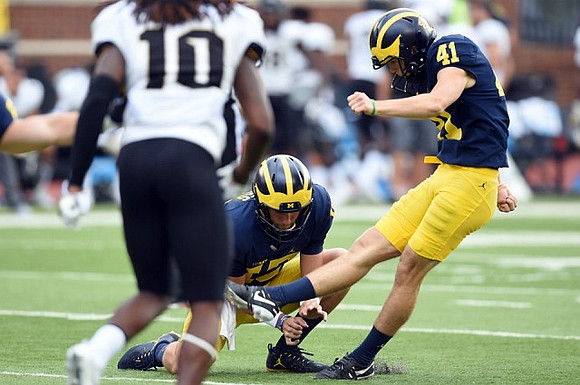 Garrett Moores (15) and Ryan Tice (41)