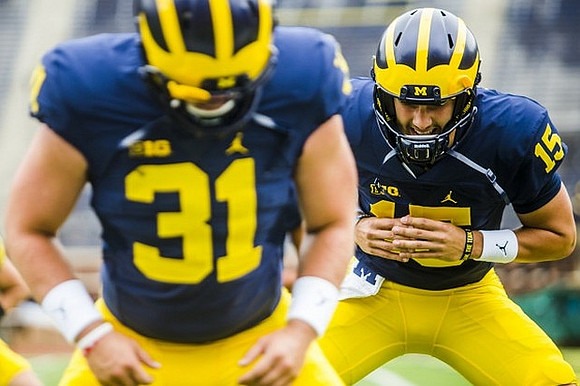 Scott Sypniewski (31) and Garrett Moores (15)