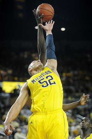 Jordan Morgan (52) and Tim Hardaway Jr. (10)