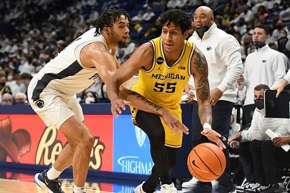 Eli Brooks (55) and Penn State Head Coach Micah Shrewsberry