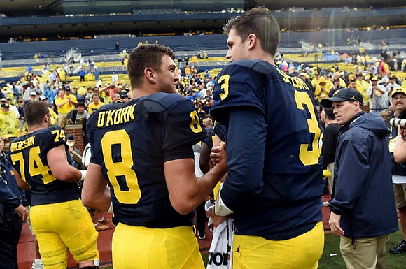 Ben Bredeson (74), John O'Korn (8), and Wilton Speight (3)