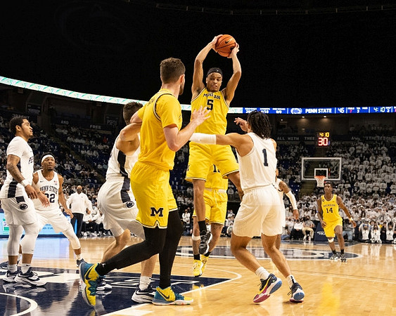 Hunter Dickinson (1), Terrance Williams II (5), and Moussa Diabate (14)