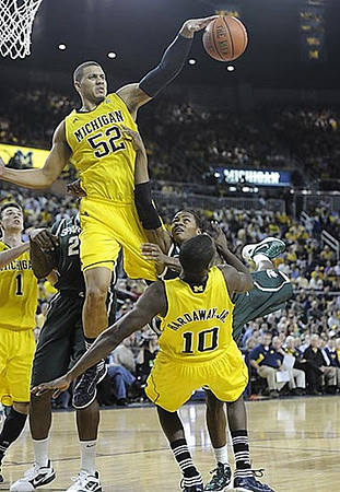 Stu Douglass (1), Jordan Morgan (52), and Trey Burke (3)