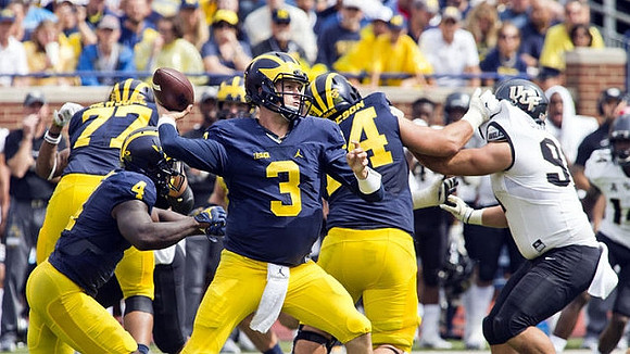 Grant Newsome (77), De'Veon Smith (4), Wilton Speight (3), and Ben Bredeson (74)