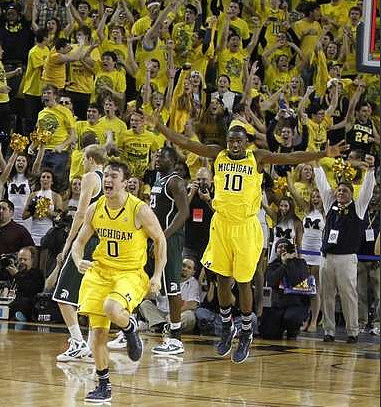 Zack Novak (0) and Tim Hardaway Jr. (10)