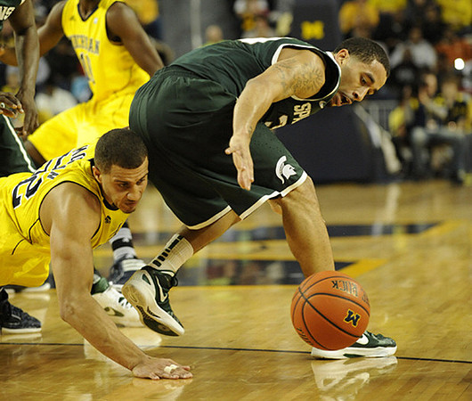 Jordan Morgan (52) and Tim Hardaway Jr. (10)