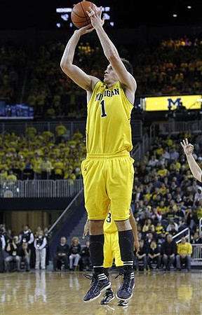 Stu Douglass (1) and Trey Burke (3)
