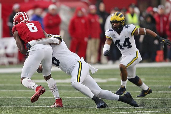 Josh Uche (6) and Cameron McGrone (44)