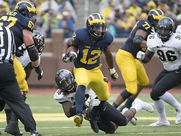 Kyle Kalis (67), Chris Evans (12), and Grant Newsome (77)