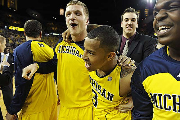 Josh Bartelstein (20), Max Bielfeldt (44), Trey Burke (3), and Carlton Brundidge (2)