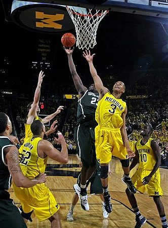 Jordan Morgan (52), Stu Douglass (1), Trey Burke (3), and Tim Hardaway Jr. (10)