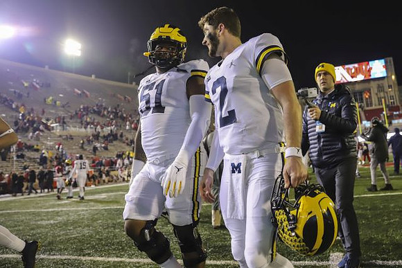 Cesar Ruiz (51) and Shea Patterson (2)