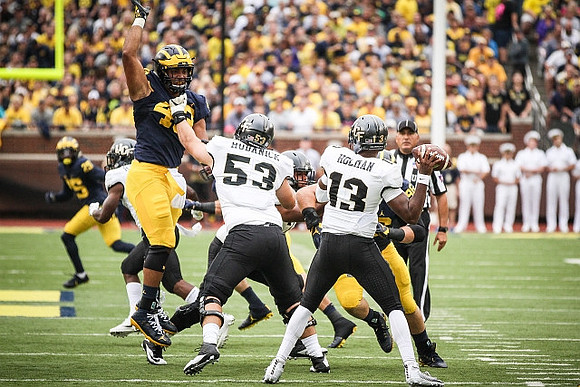 Maurice Hurst (73), Chris Wormley (43), and Ryan Glasgow (96)