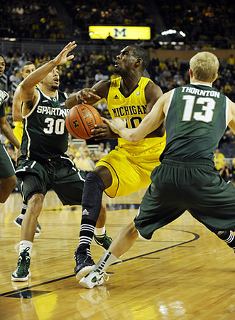 Jordan Morgan (52) and Tim Hardaway Jr. (10)