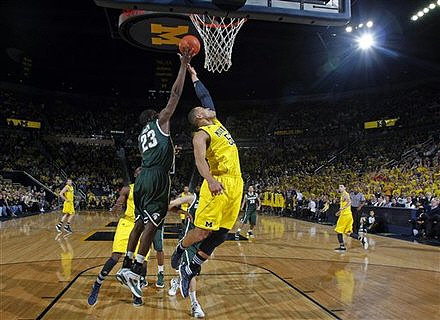 Zack Novak (0), Tim Hardaway Jr. (10), Jordan Morgan (52), Trey Burke (3), and Stu Douglass (1)
