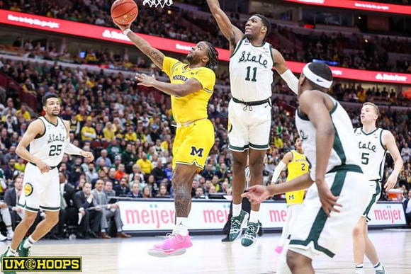 Zavier Simpson (3) and Jordan Poole (2)