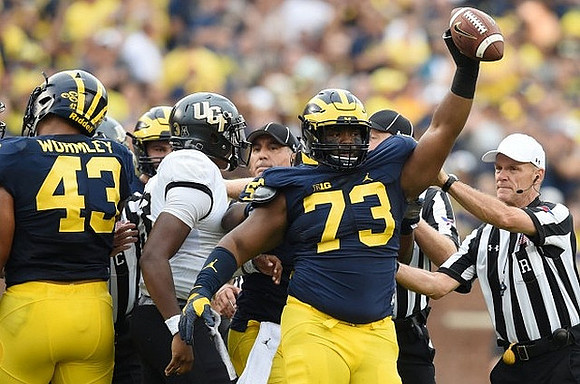 Chris Wormley (43) and Maurice Hurst (73)