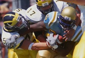 Eric Brackins (51) and Larry Foote (17)