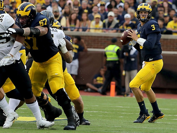 Kyle Kalis (67) and Wilton Speight (3)