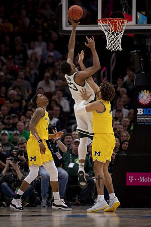 Charles Matthews (1) and Isaiah Livers (4)