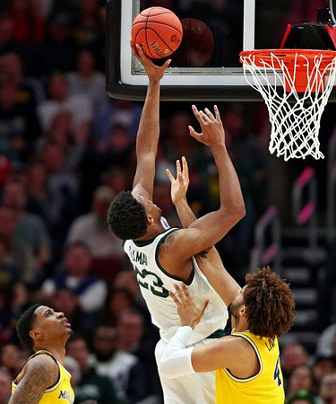 Charles Matthews (1) and Isaiah Livers (4)