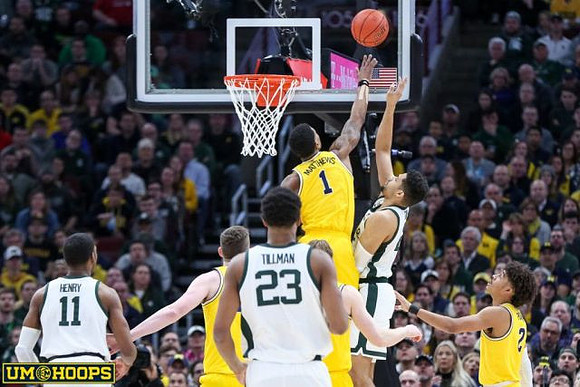Jon Teske (15), Charles Matthews (1), and Jordan Poole (2)